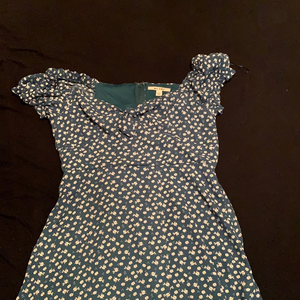 Green dress with white flowers. Size large. Never worn.